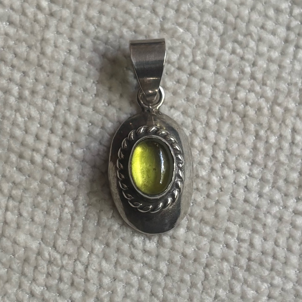 Vintage Peridot Gemstone Silver Pendant with Ornate Design